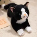 Adorable peluche de gato negro y blanco tumbado simulación muñeco juguete de compañía - Negro