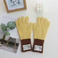 Close-up view of color-blocked knitted winter gloves showcasing cozy ribbed cuffs and labels. - 25*8cm / Yellow