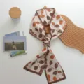 Detail view of a chic autumn leaf print narrow silk scarf, elegant twilly ribbon for women. - Leaf Print (01#)