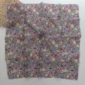 Detail view of a floral print cotton linen small square scarf, soft vintage floral bandana. - White