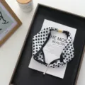 Black and white polka dot silk scarf with magnetic buckle and pearl pendant detail. - 51*4cm / Polka Dot