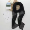 Close-up of elegant black long linen scarf, minimalist style, delicate texture and detail. - 184*12cm / Black