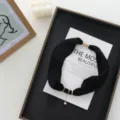 Black fabric neckerchief detail with gold rings and pearl pendant in elegant flat lay. - 52x6cm / Black