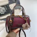 Vintage contrast color Boston bag, suede and patent leather handbag, stylish commuting shoulder bag. - Red With Pendant