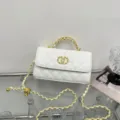 Elegant white quilted crossbody bag with gold chain strap, stylish chic fashion handbag for women. - White