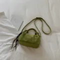 Green suede dumpling shoulder bag, retro ruched handbag with top handle and crossbody strap. - Green with Charm