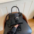 Black crocodile pattern handbag, stylish top handle bag with metal buckle for women daily wear. - Black