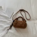 Brown suede shoulder bag, stylish ruched crossbody dumpling handbag with tassel for women. - Brown with Pendant