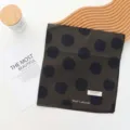 Detailed view of the retro black polka dot pure cotton scarf, showing soft fabric texture and tags. - 55x55cm / Brown Polka Dot Style (01#-棕波)
