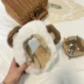 Fluffy plush earmuffs for women, cute animal ear design, warm and soft winter ear warmer. - White