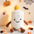 Cute Halloween candle plush toy with smiling face, soft stuffed doll for holiday decor. - 17cm Candle