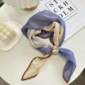 Detailed view of the stylish pleated colorblock square scarf with contrast edges. - Scarf 5
