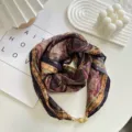 Detailed view of elegant floral print square scarf with magnetic clasp, stylish neck accessory. - Scarf-9
