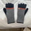 Knit touchscreen gloves in grey and black with orange stripe detail for winter warmth. - One Size / Dark Blue Grey