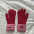 Detailed view of women winter knitted gloves with fuzzy cuffs and warm thick stretch fabric. - One Size / Rose Pink
