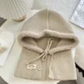 Detailed shot of the knitted hooded scarf in khaki, featuring plush lining and cute buttons. - 45cmx33cm / Khaki