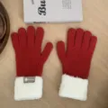 Close-up of cozy red winter knit gloves with soft white fluffy plush cuffs for women warmth. - One Size / Red