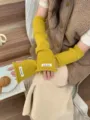 Mitaines tricotées jaunes gants sans doigts pour femmes, longues manches côtelées. - Taille unique / Jaune