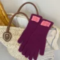 Cozy purple knit gloves with cute pink label, warm winter five-finger design for daily wear. - Plum Color