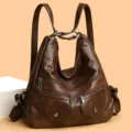 Classic dark brown women's leather backpack versatile multi-pocket shoulder bag casual daily use. - Coffee