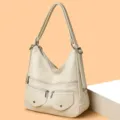 Sac à bandoulière élégant en cuir souple pour femme avec multiples poches pratiques - Blanc Cassé