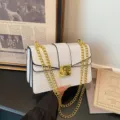 Chic white crocodile pattern shoulder bag with gold chain and lock, stylish crossbody purse. - White