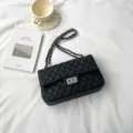 Black quilted chain shoulder bag for women, classic commuter crossbody bag with stylish design. - Black