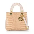 Chic apricot croc-embossed top handle handbag with gold hardware and shoulder strap. - Off White