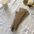 Close-up shot of winter warm knitted gloves in solid camel color on a cozy white fabric. - One Size(30cmX8cm) / Deep Khaki