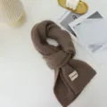 Brown knitted scarf for women, thick warm winter neck warmer with stylish label patch detail. - Deep Khaki