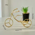 Gold iron bicycle plant holder with artificial succulent pot for home desk decor. - Tricycle Back Seat
