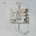 Patère murale en bois style méditerranéen avec décoration de voilier et coquillage maison. - Couleur Bois Lot de 4 Crochets Voilier