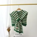 Detailed view of the stylish green and white striped knitted faux collar scarf with a cute label. - One Size / Green