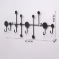 Black metal wall mounted coat and key rack with modern minimalist design hooks for home decor. - Large Dot Hook / Black