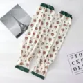 Détails des manches de protection solaire en soie glacée à motifs floraux et poignets verts. - Taille unique / Vert Foncé Élastique Floral