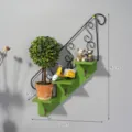 Wall mounted iron staircase shelf with potted plant and cute animal figurines for living room decor - Green