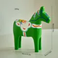 Handcrafted wooden Dala horse figurine, green traditional painted Nordic home decor ornament. - Hand-Painted Green Wooden Horse - Small