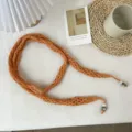 Orange knitted narrow scarf with beaded ends, stylish hollow chic accessory for women. - F Solid Color Hollow-Out Baguette Bag - Orange
