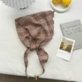 Details of the vintage plaid triangle scarf with wooden bead ties in a cozy aesthetic setup. - 110*26cm / Pink Purple