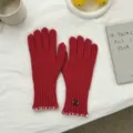 Cozy red knit gloves for women featuring white stitching cuffs and cute button detail winter wear. - 25*9cm / Red