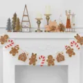 Guirlande de bonshommes en pain d'épices de Noël bannière décorative pour cheminée - Maison de neige en pain d'épices
