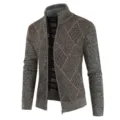 Men's knitted zip cardigan sweater detail showing argyle texture and stand collar style. - M / Brown