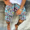 Men's colorful sugar skull print casual shorts with drawstring, comfortable summer beach wear. - Blue