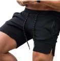 Schwarze Herren Sportshorts mit Reißverschluss Taschen, bequeme Sommer Fitness kurze Hosen. - M / Schwarz