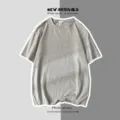 T-shirt gris uni à manches courtes, col rond décontracté, haut basique confortable et ample - S / Hauts / Gris