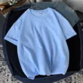 Camiseta casual de manga corta azul claro para mujer, corte holgado de verano. - Azul claro
