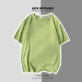 T-shirt à manches courtes décontracté vert pour hommes et femmes, coupe ample uni. - Vert clair / S
