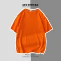 T-shirt à manches courtes uni décontracté pour homme et femme, haut basique ample au quotidien. - Orange / S