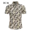 Detailed close-up view of the men's casual short sleeve paisley printed button-up shirt top. - DC36 Black