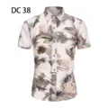 Detailed view of men's tropical palm leaf print short sleeve Hawaiian beach shirt. - DC38 Apricot